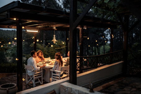 a family eating on the patio